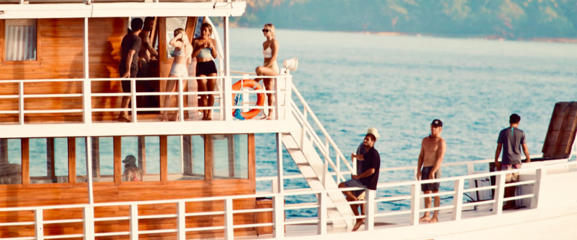 peoples enjoying on a yacht