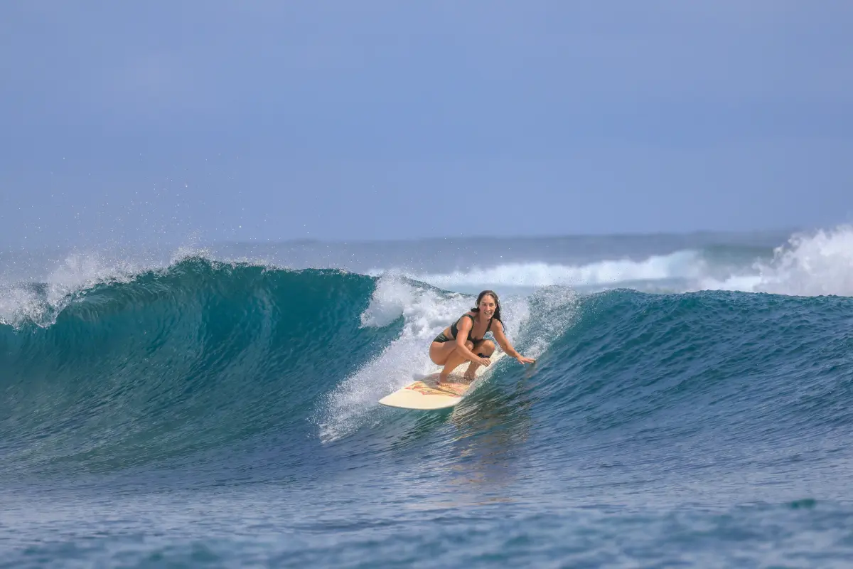 Girl enjoying surfing