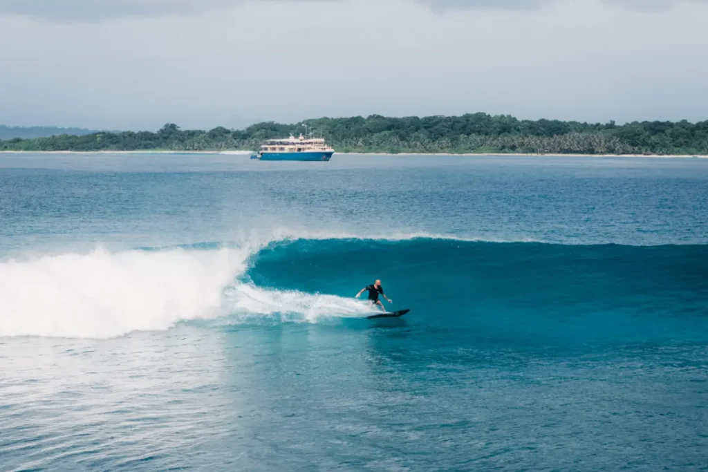 man surfing on sea waves