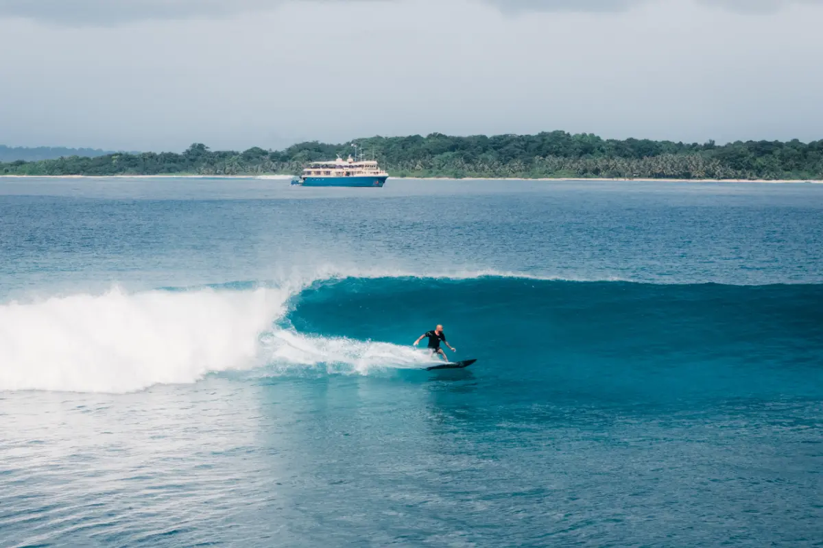 man surfing on sea waves