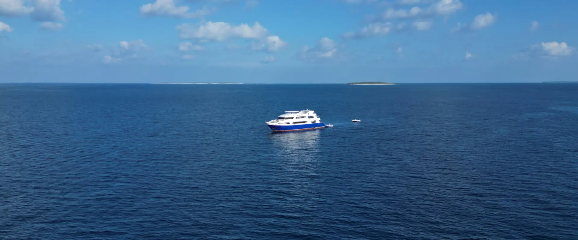 sea view of a island and yacht